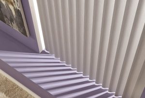IMAGE OF WHITE VERTICAL BLINDS WITH PURPLE RUG