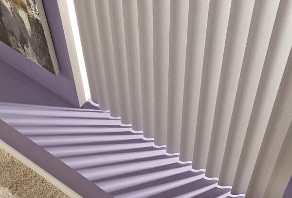 IMAGE OF WHITE VERTICAL BLINDS WITH PURPLE RUG